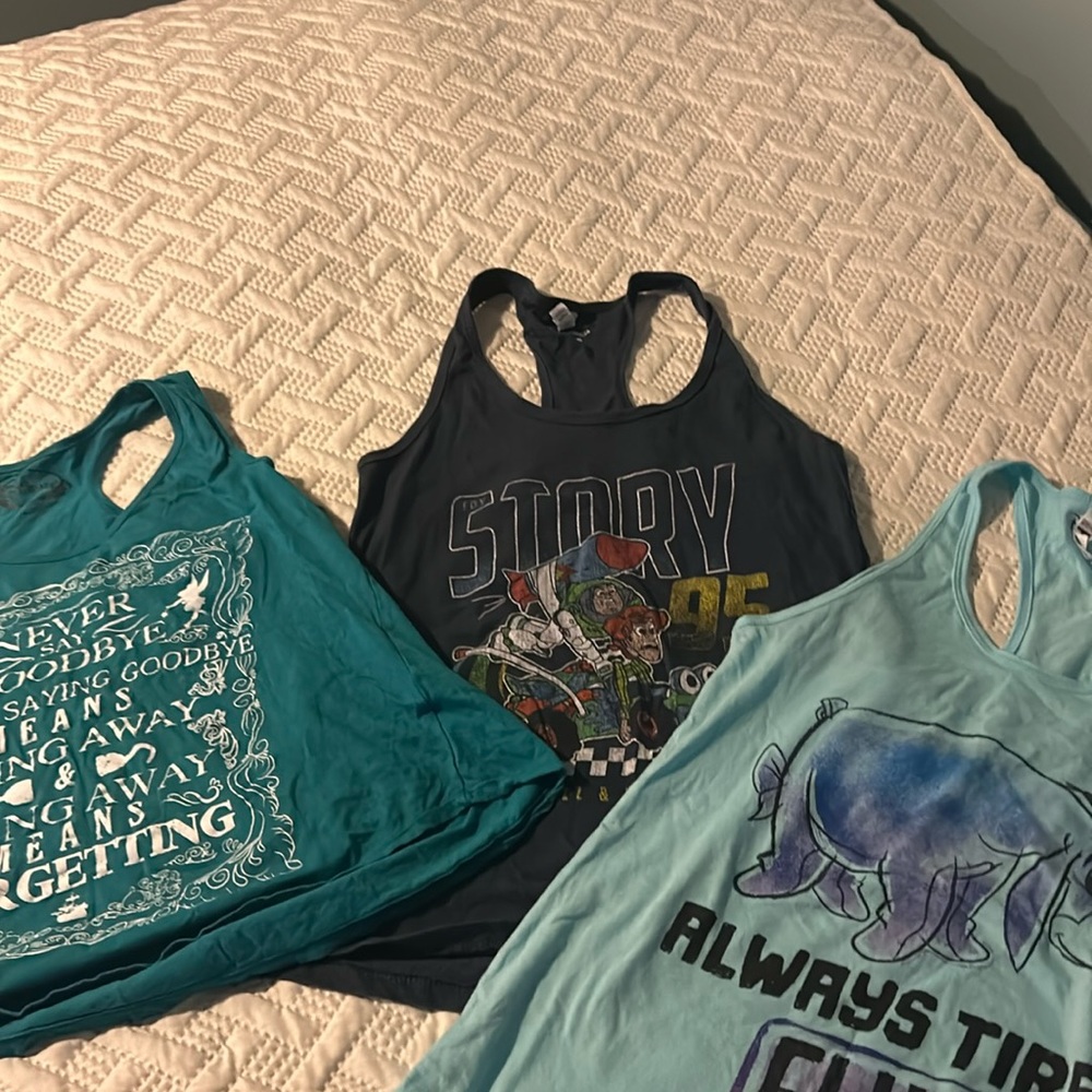 Three Disney tank tops